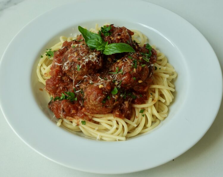 Homemade Italian beef meatballs and spaghetti with tomato sauce