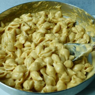 creamy skillet mac and cheese made with cheddar and colby jack, coated in a rich homemade cheese sauce