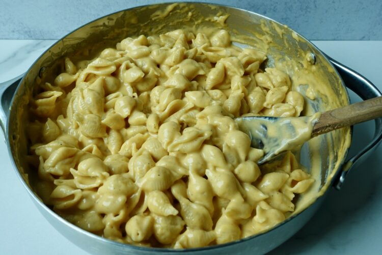 creamy skillet mac and cheese made with cheddar and colby jack, coated in a rich homemade cheese sauce