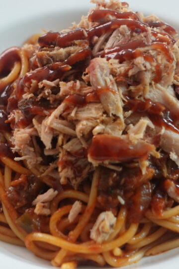 Memphis BBQ spaghetti made with chopped pulled pork in a smoky barbecue tomato sauce.