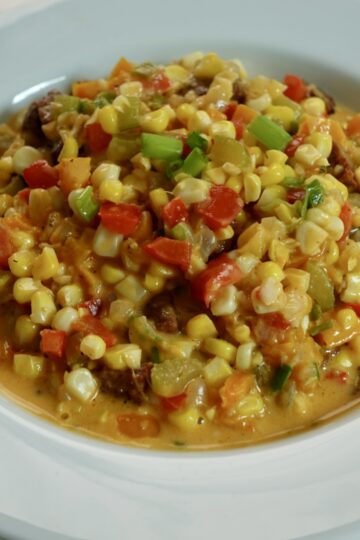 Louisiana maque choux made with fresh corn, bell peppers, onion, celery, and andouille sausage.